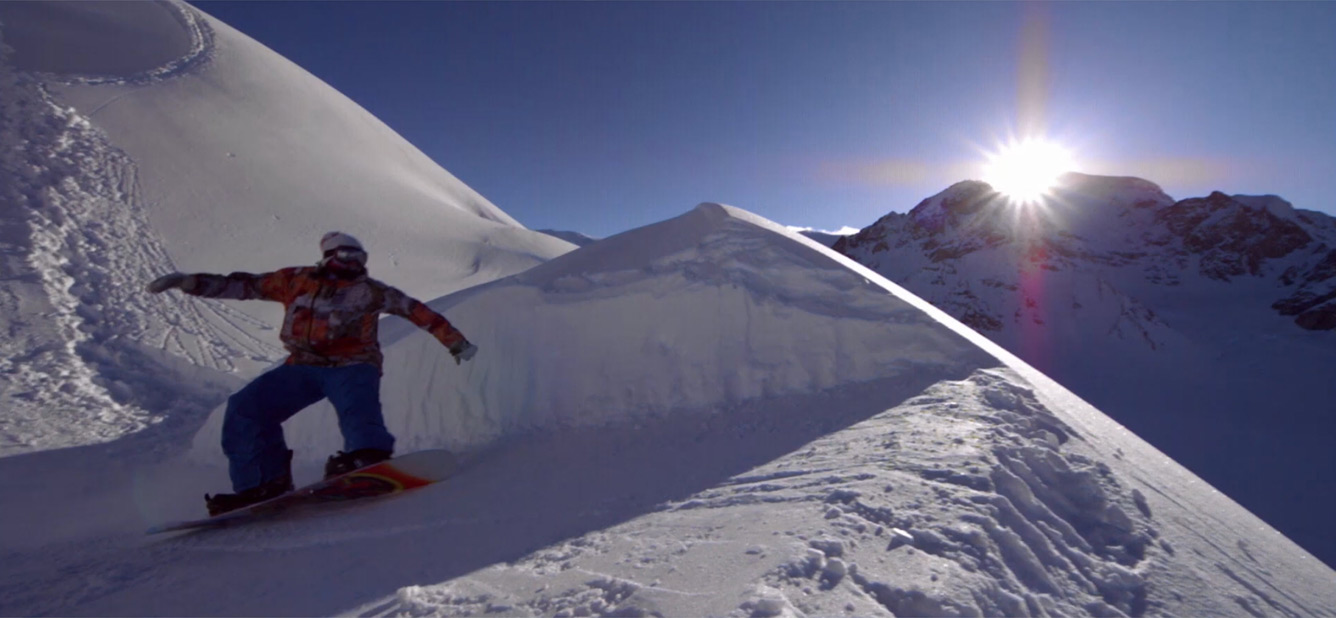 iPhone 16e showing a snowboarding clip