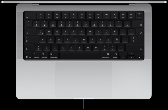 Vista desde arriba de una MacBook Pro de 14 pulgadas que muestra el trackpad Force Touch debajo del teclado