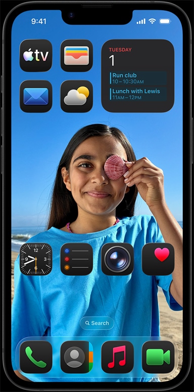 iPhone 16e otoczony przez apki takie jak Poczta, WhatsApp, Safari, Mapy, Apple Music, Zdjęcia, Notatki i Dom
