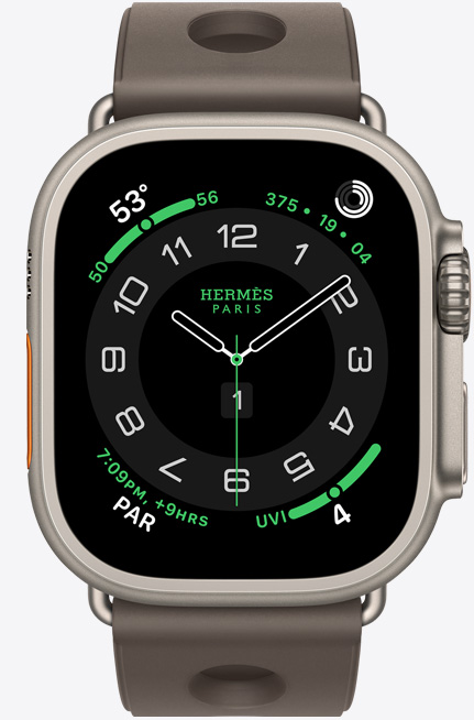 Apple Watch Hermès Ultra 3, titanium case, natural color, Hermès Circulaire watch face, complications: weather, activity rings, Paris time, UV index, right side exterior, Digital Crown, microphone, raised side button, Scub'H Diving band, gris titane color
