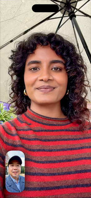 iPhone Air, front exterior, Center Stage for video calls feature in use with two people on a FaceTime call