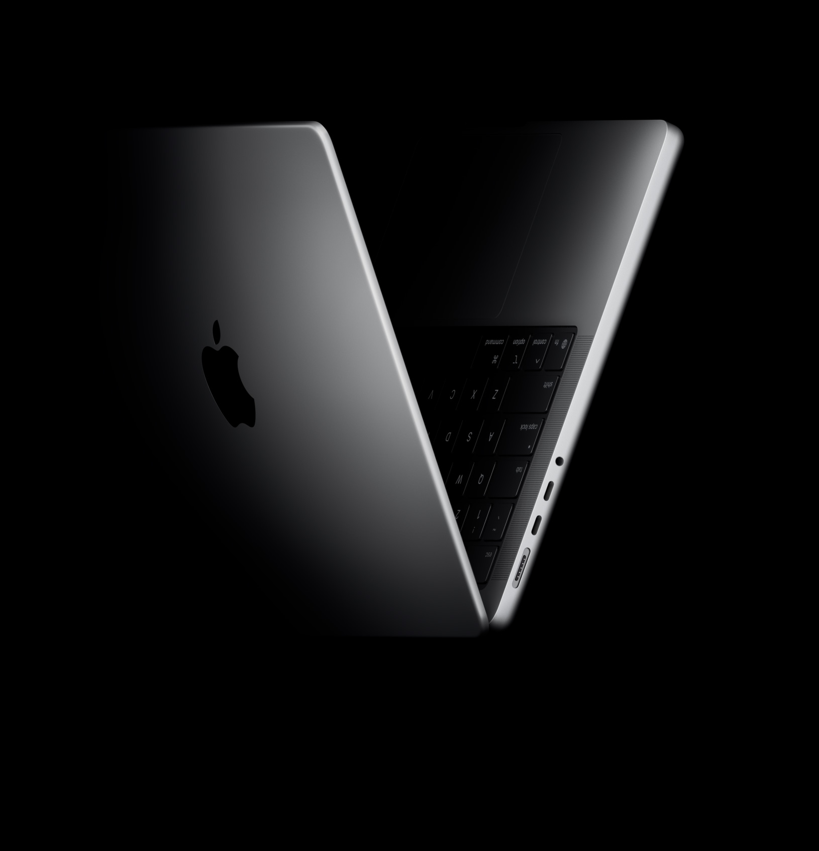 MacBook Pro aperto a forma di V, come a indicare il chip M5
